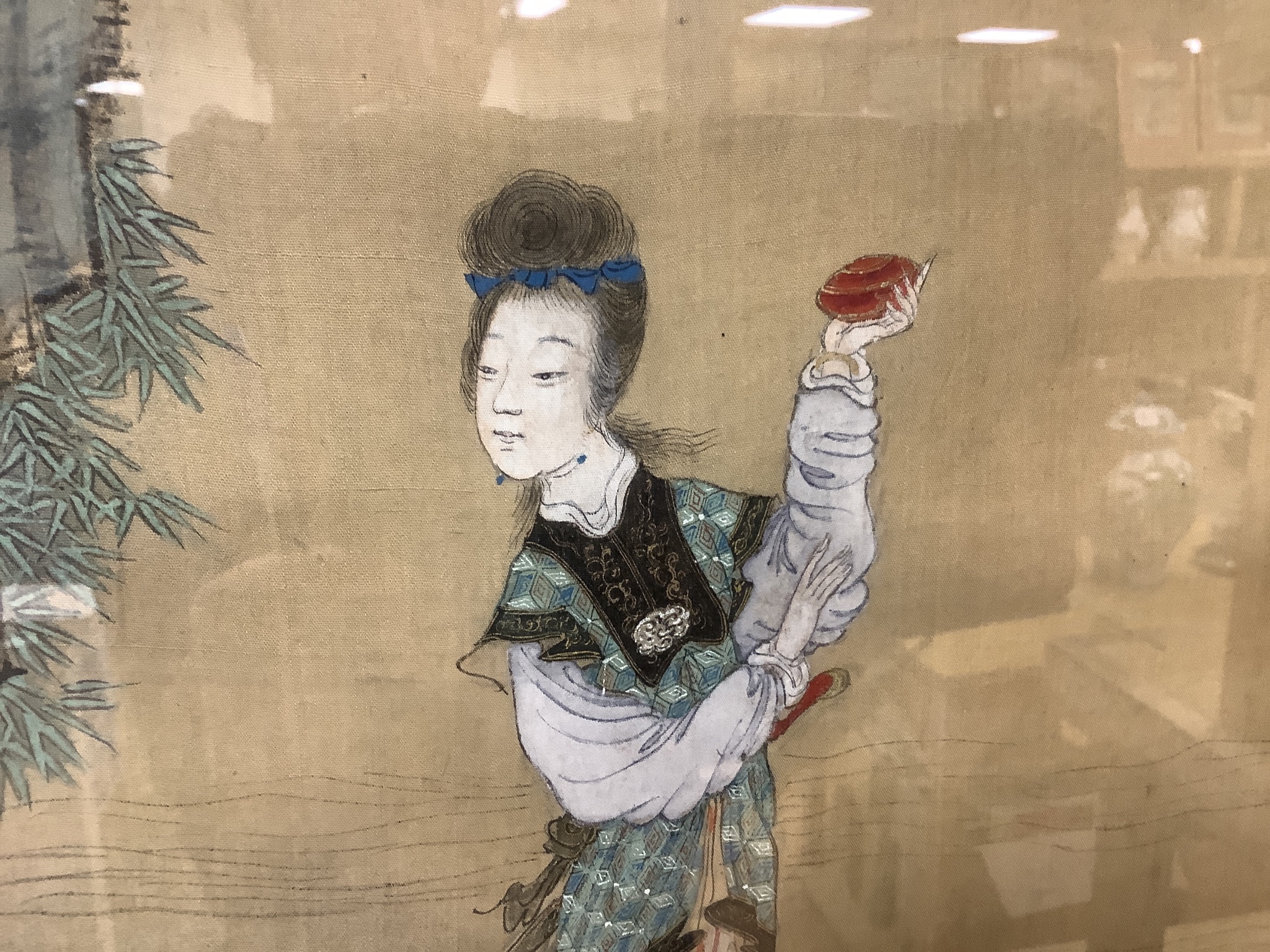 A large Chinese watercolour on silk, late 19th/early 20th century, woman in a landscape, signed, 91 x 42cm.